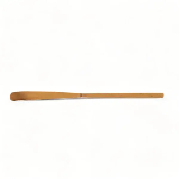 Wooden spatula on a white background