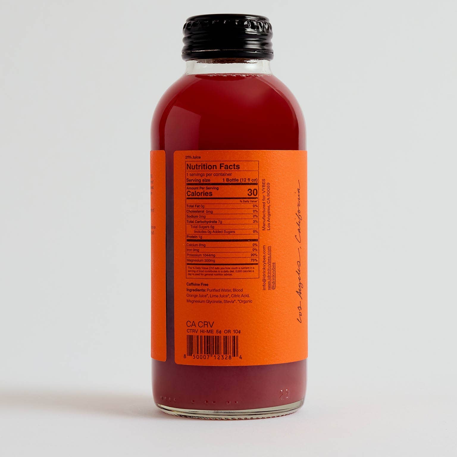 Bottle with an orange label on a white background