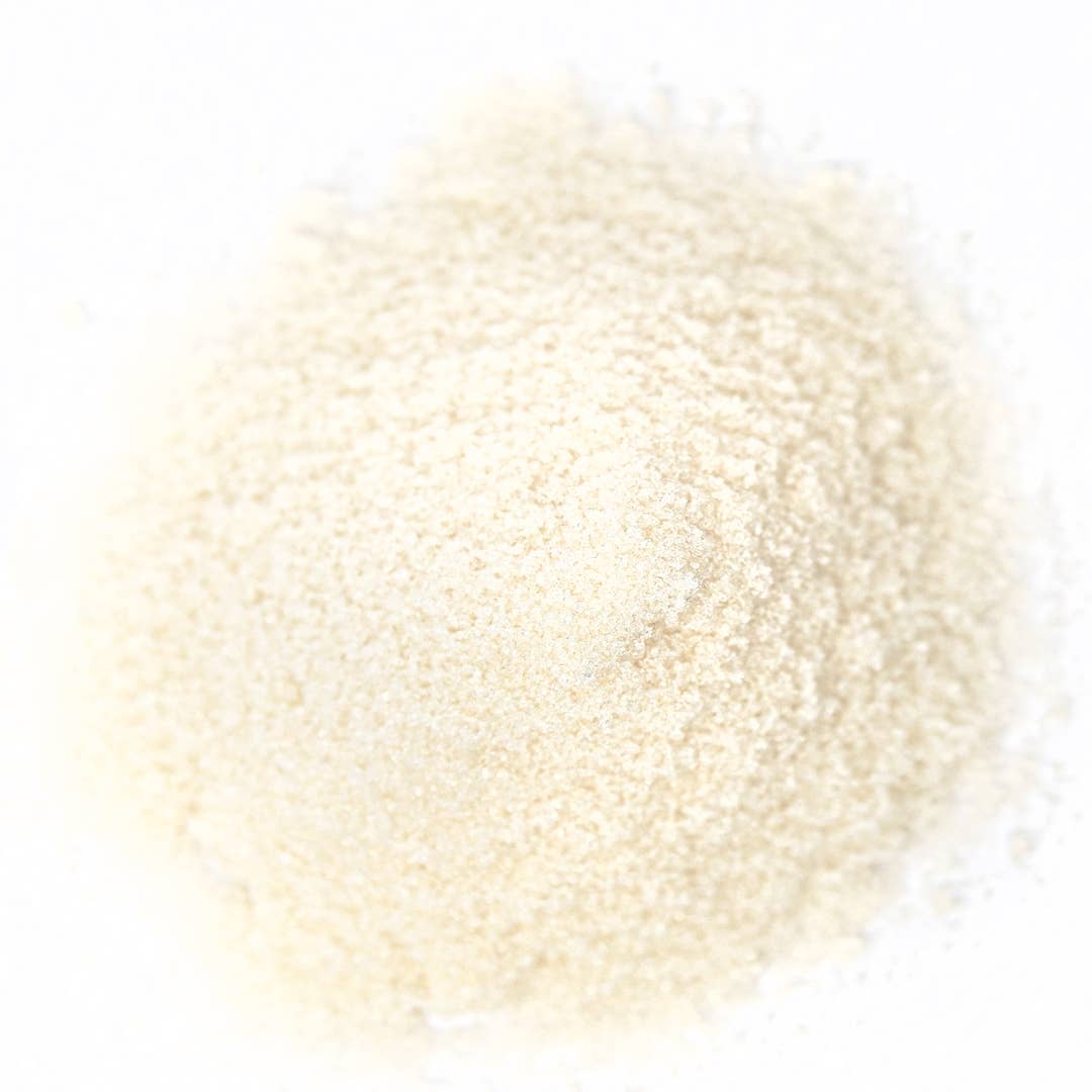 Mound of lime cocktail rimming salt on a white background