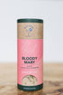 Pink cylindrical container of Bloody Mary salt cocktail rimmer with &
