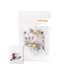 Floral tea packaging with dried flowers on a white background