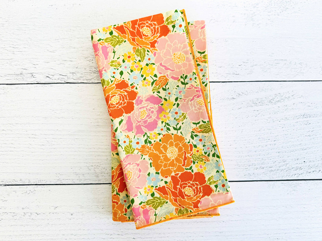 Floral patterned fabric on a white wooden surface