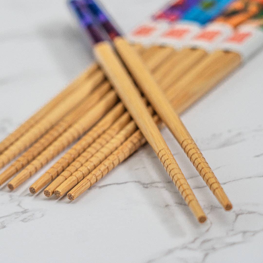 Set of wooden chopsticks on a marble surface