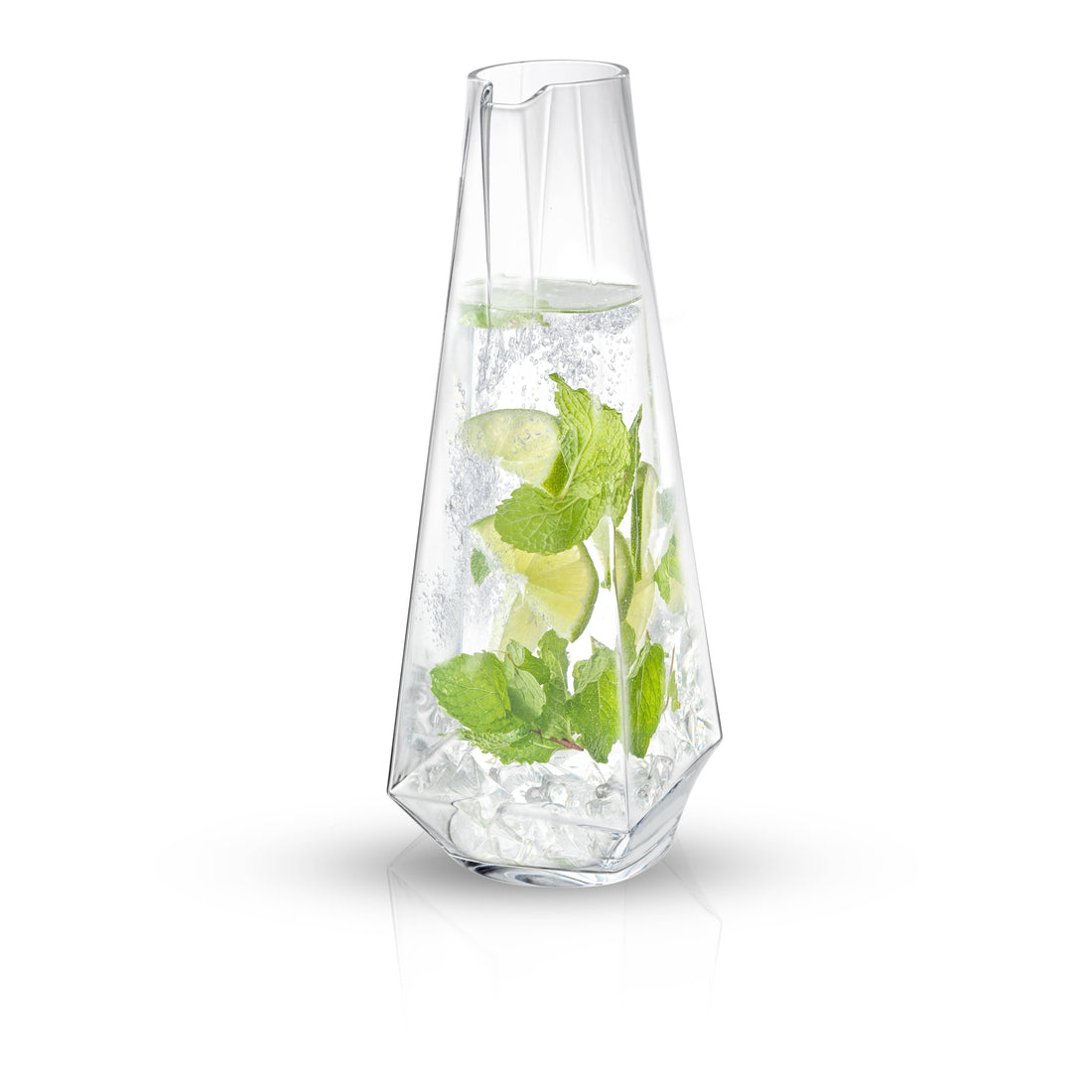 Clear glass vase with water and green leaves on a white background