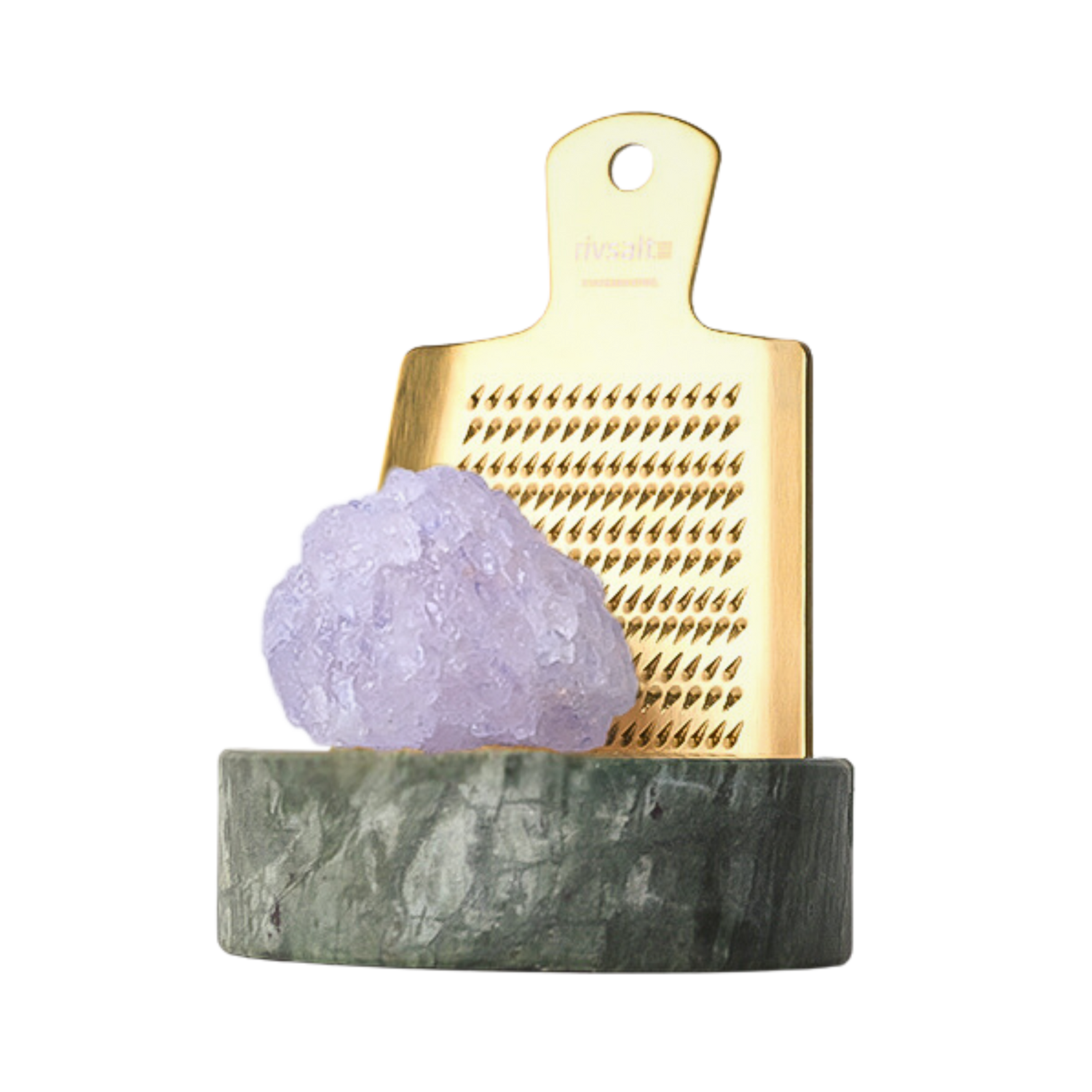 Small gold grater with a purple crystal on a gray base against a white background