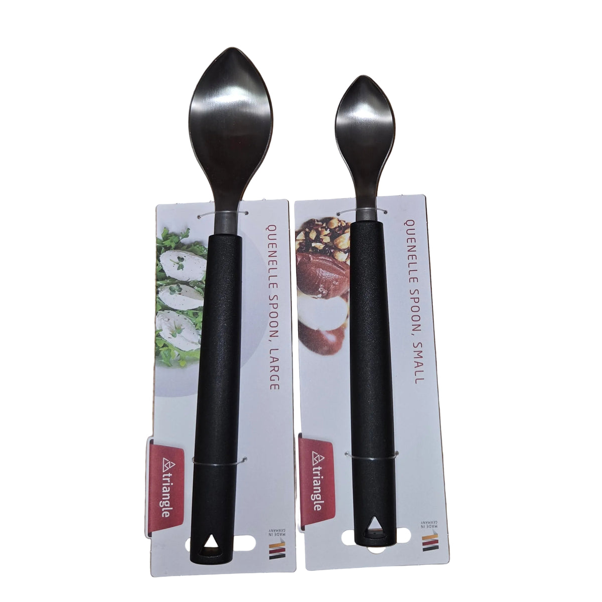 Two Triangle quenelle spoons, one small and one large, with black handles and stainless steel bowls, shown on their original white packaging cards on a white background