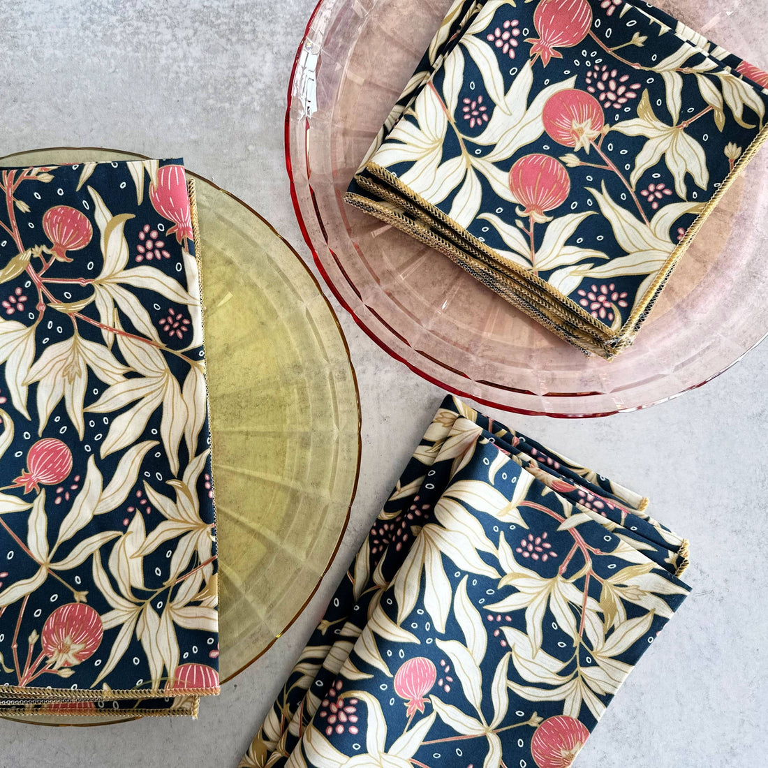 Floral-patterned napkins on a gray surface