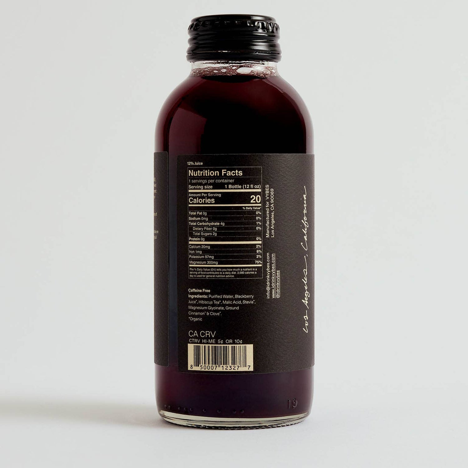 Bottle with a black label on a white background
