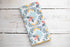 Honey bee napkins on a wooden surface