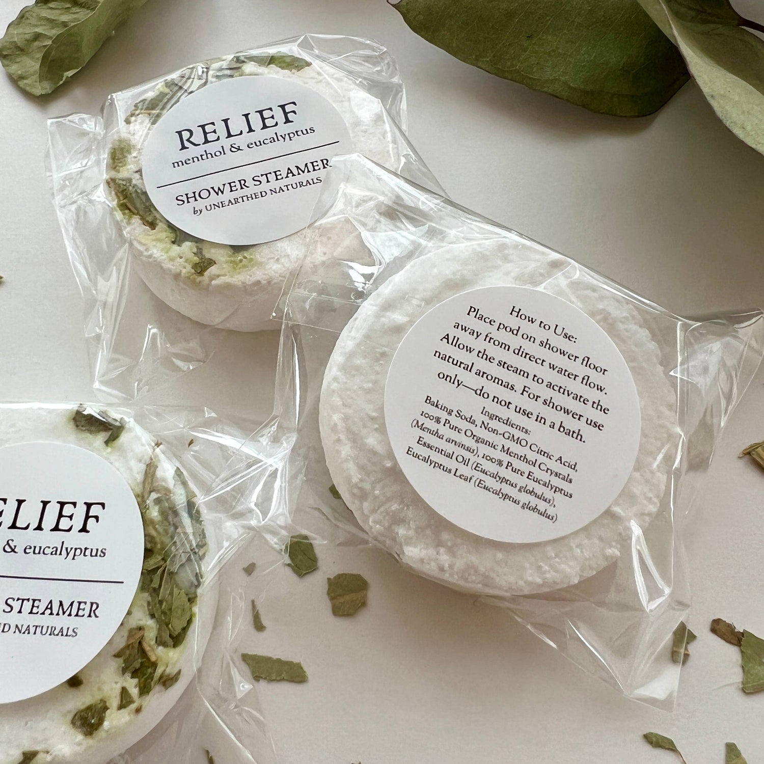 Shower steamer packaging with &