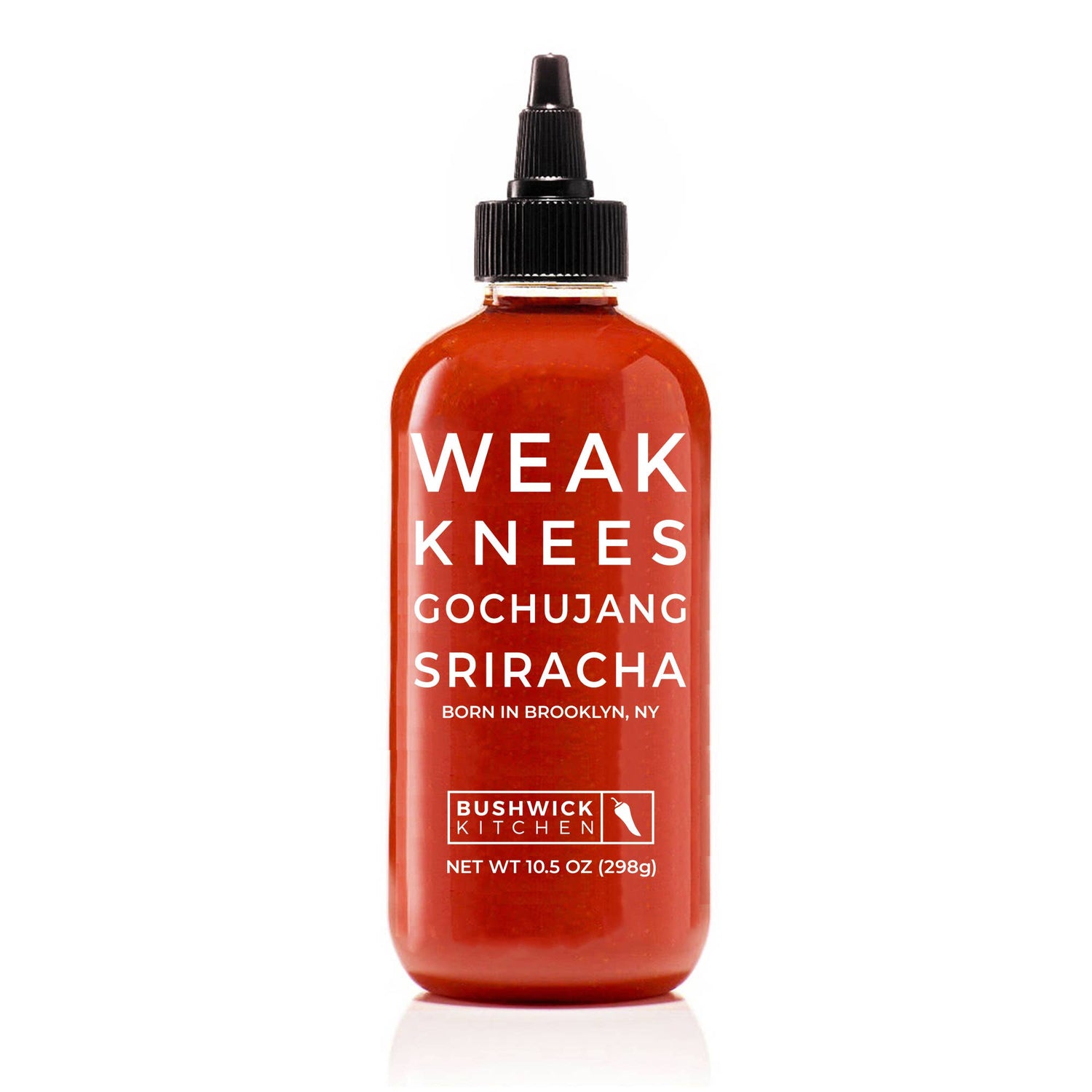 Bottle of Weak Knees Gochujang Sriracha sauce on a white background