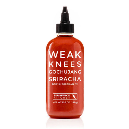 Bottle of Weak Knees Gochujang Sriracha sauce on a white background