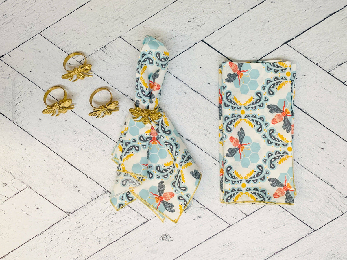 Honey bee napkins shown with honey bee napkin rings