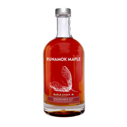 Bottle of Runamok Maple syrup on a white background