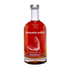 Bottle of Runamok Maple syrup on a white background