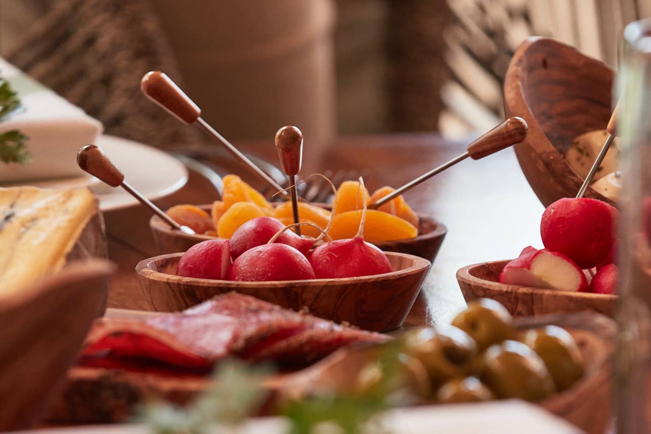 Italian Olivewood Aperitivo Bowls filled with radishes and dried fruit