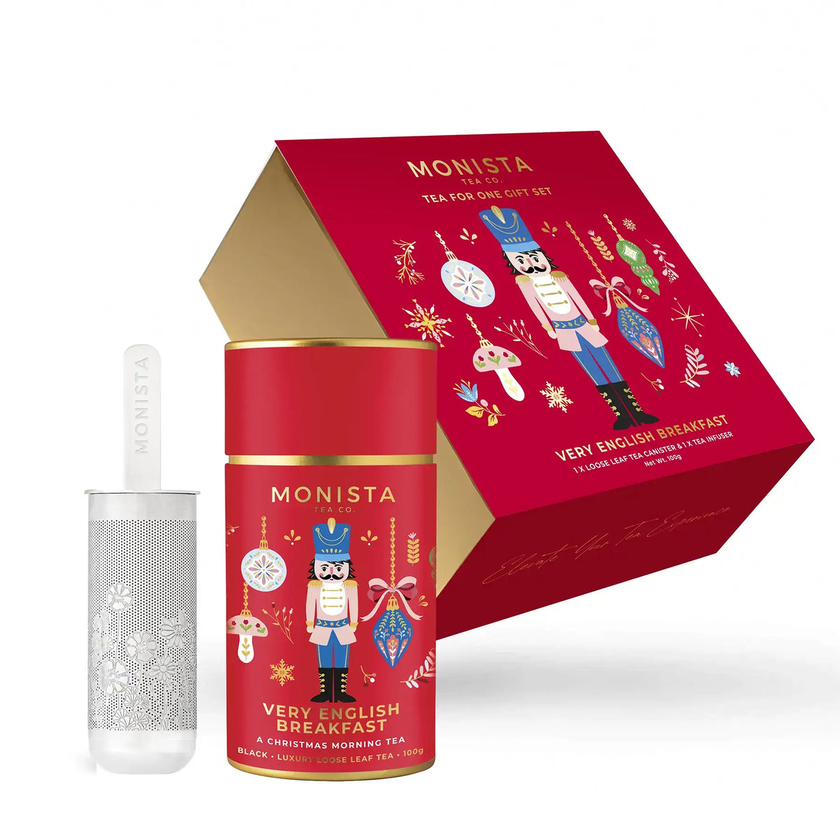 Monista Very English Breakfast Christmas black tea set with red canister, silver tea infuser stick, and decorative box on a white background