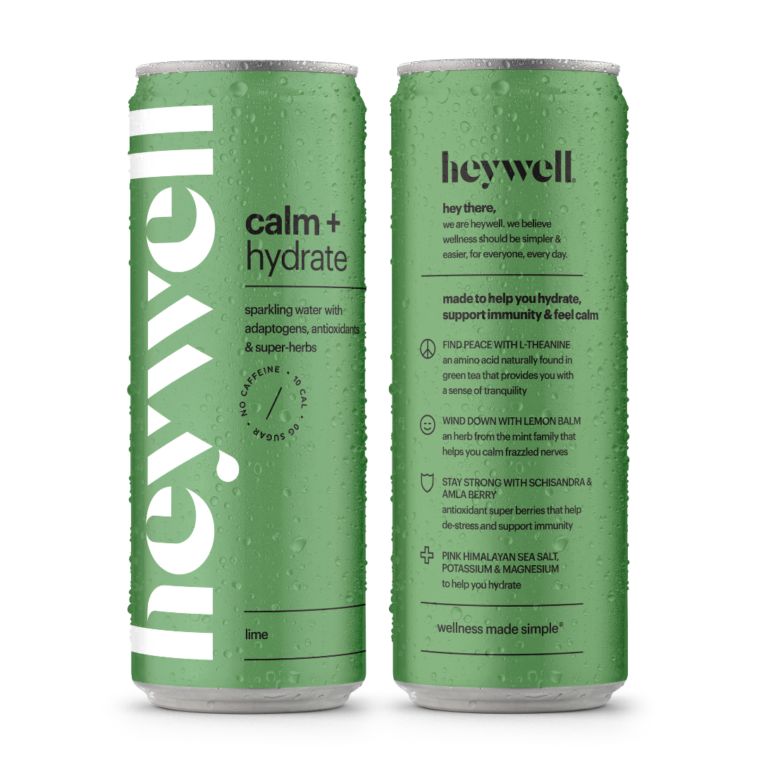 Two green cans of heywell calm + hydrate on a white background