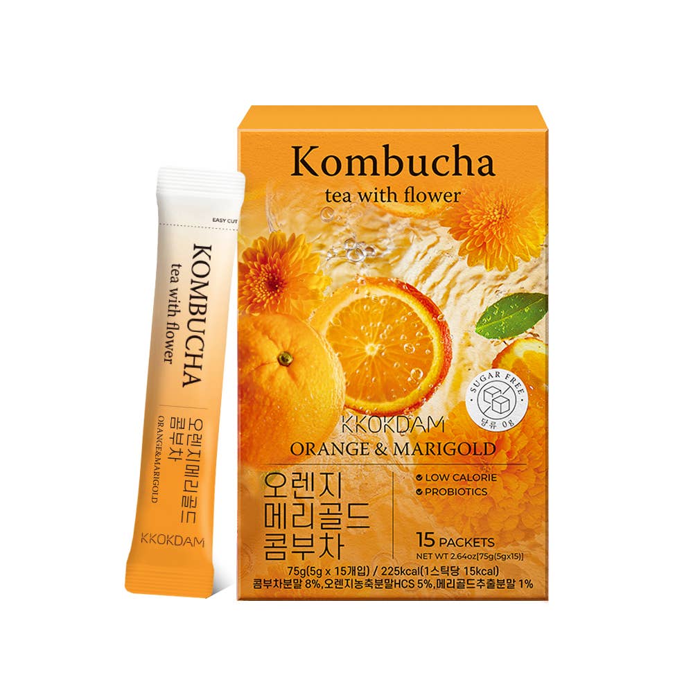 Kombucha tea packaging with orange slices and marigold flowers on a white background