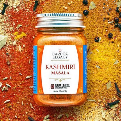 Jar of Cardoz Legacy Kashmiri Masala spice mix on a background of spices