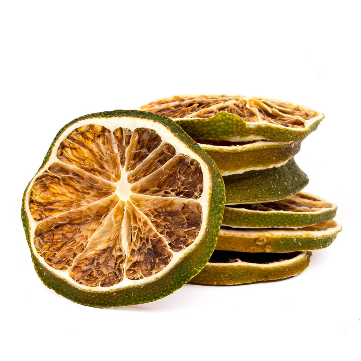 Dried lime slices on a white background