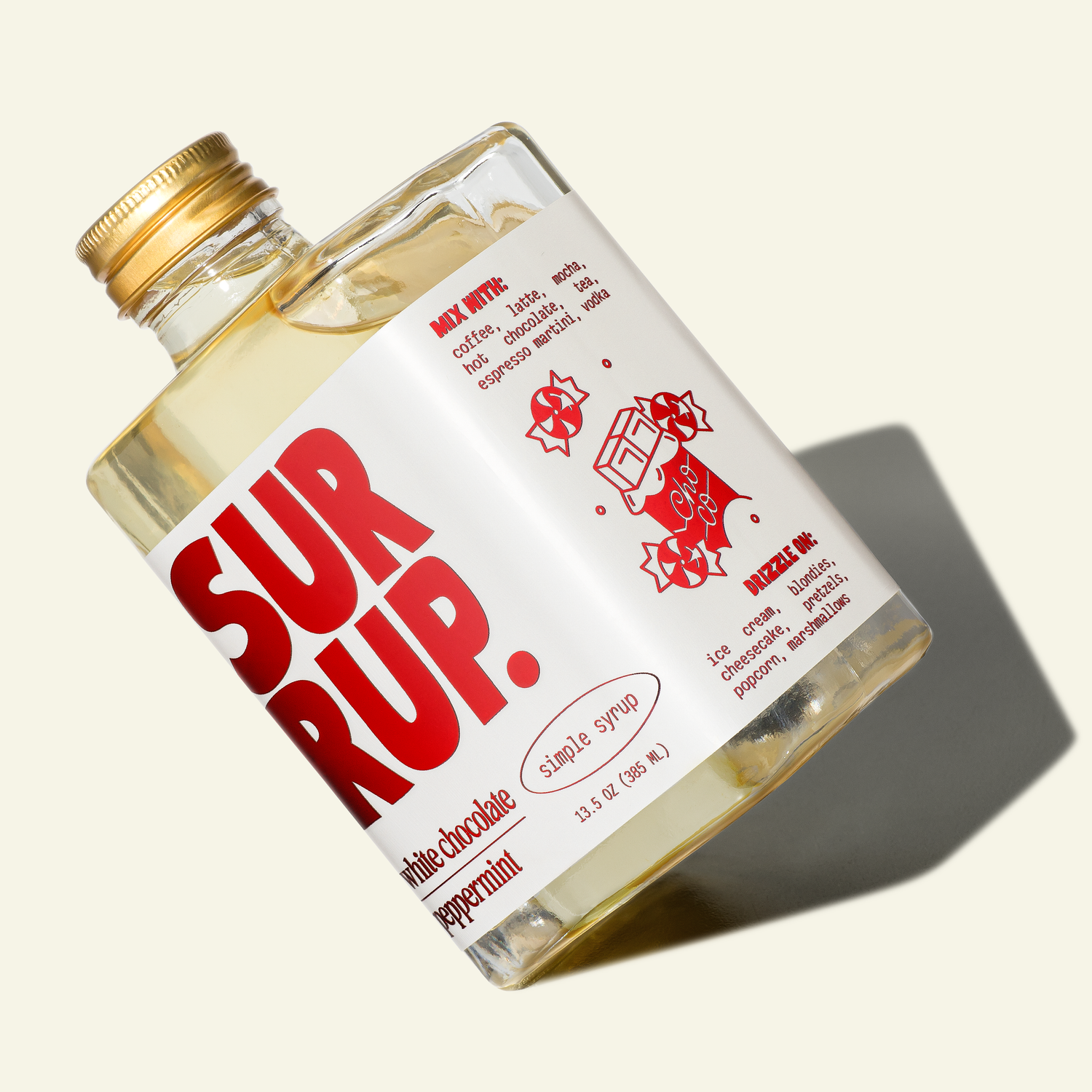 Bottle of Surup syrup with a white label and gold cap on a light background