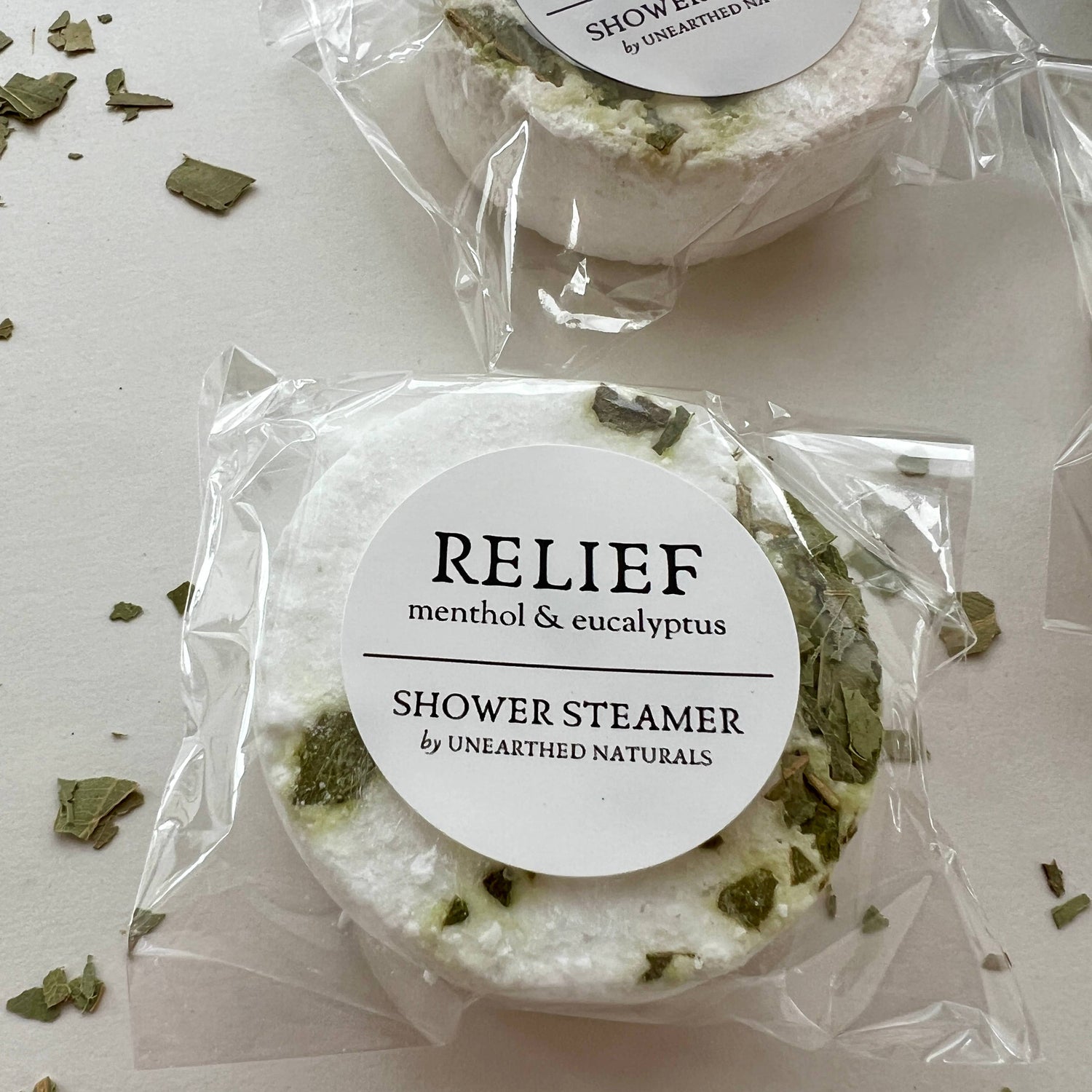 Shower steamer labeled &