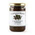 A glass jar of Casablanca Market Moroccan Tapenade with a white label and a gold metal lid, set against a plain white background.