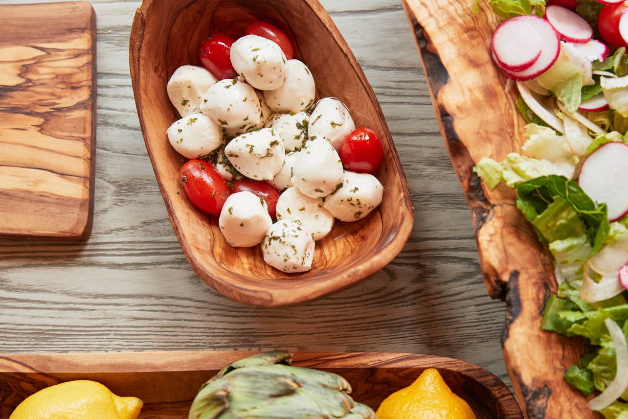 Italian Olivewood Serving Bowl filled with mozzarella and tomatoes