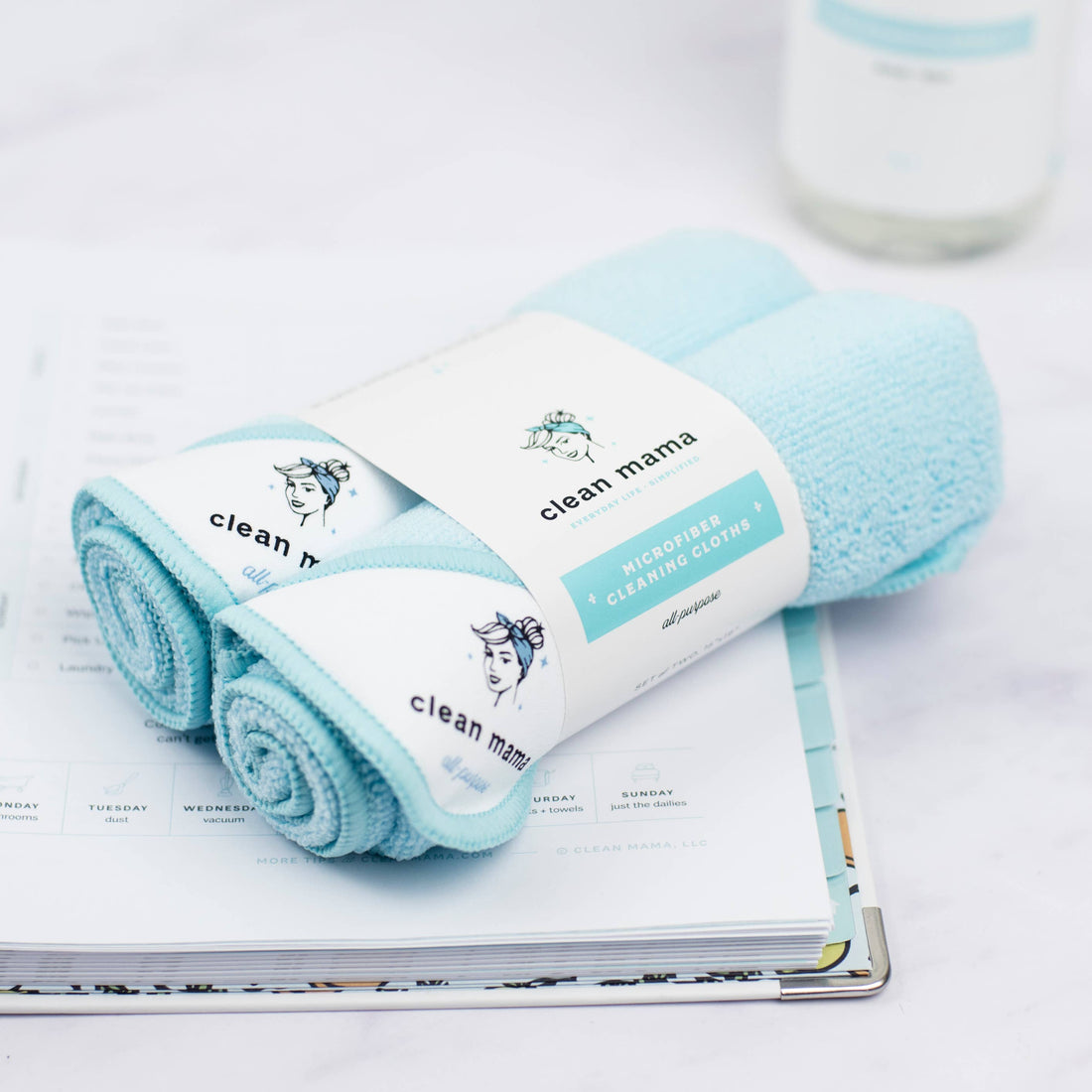 Rolls of light blue cleaning cloths with &