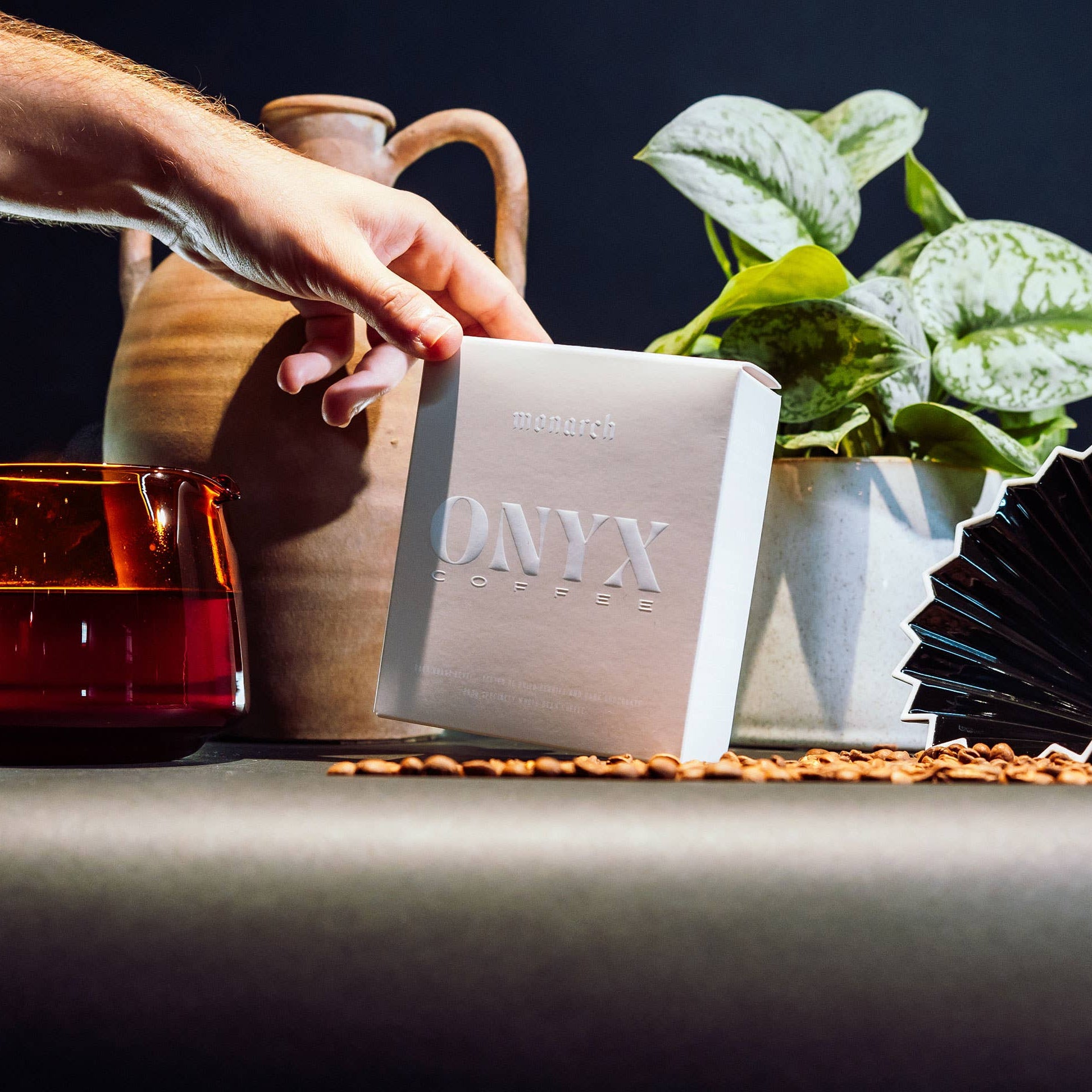 Tabletop setting with a box labeled &