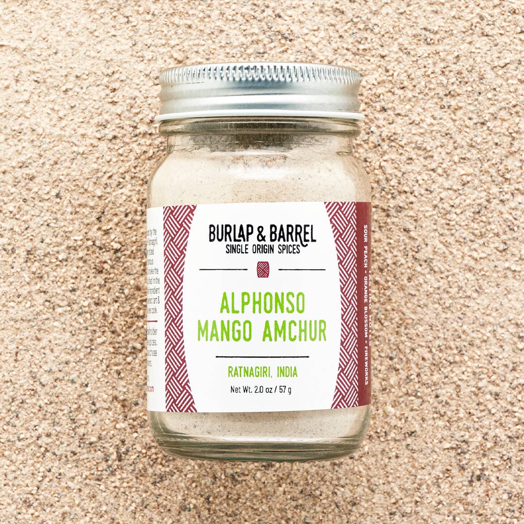 A glass jar of Burlap &amp; Barrel Alphonso Mango Amchur spice