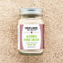 A glass jar of Burlap & Barrel Alphonso Mango Amchur spice