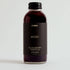 Bottle of VYBES Blackberry Hibiscus drink on a white background