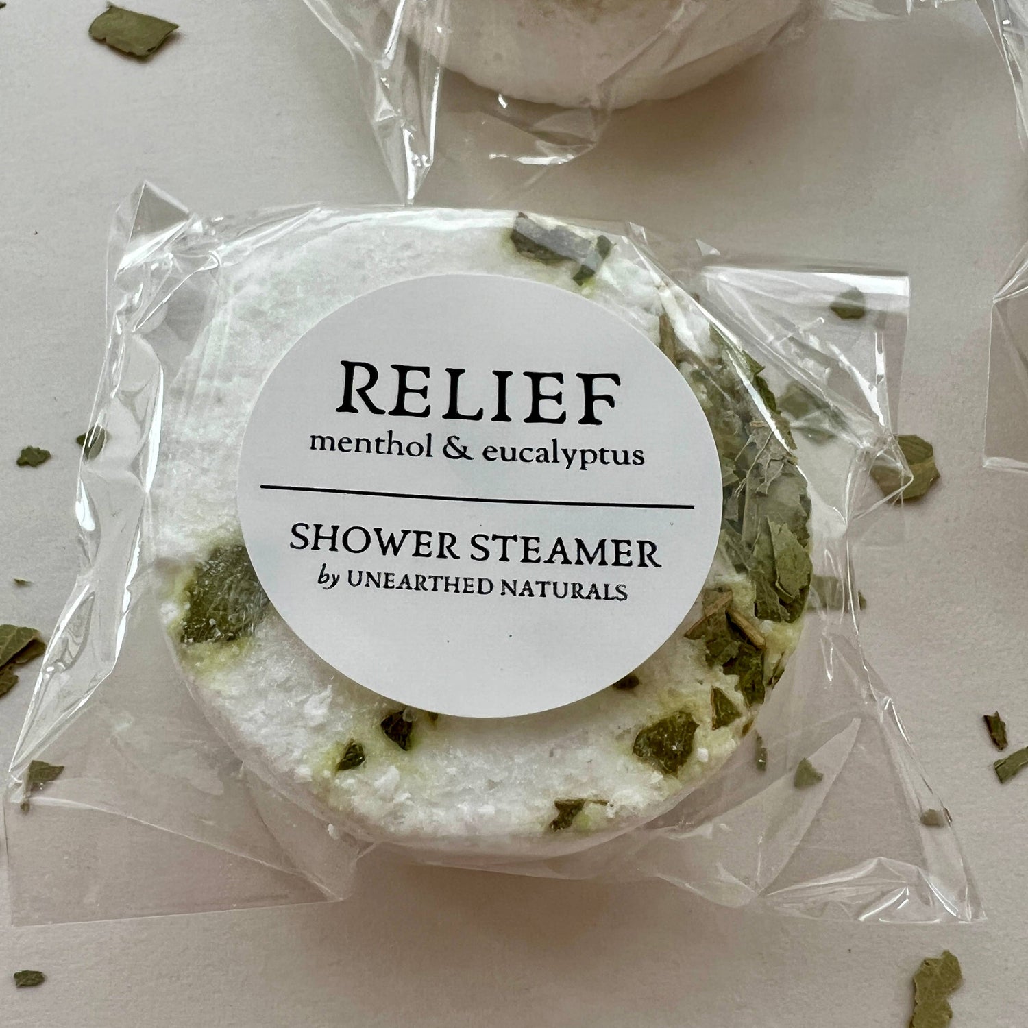 Shower steamer labeled &