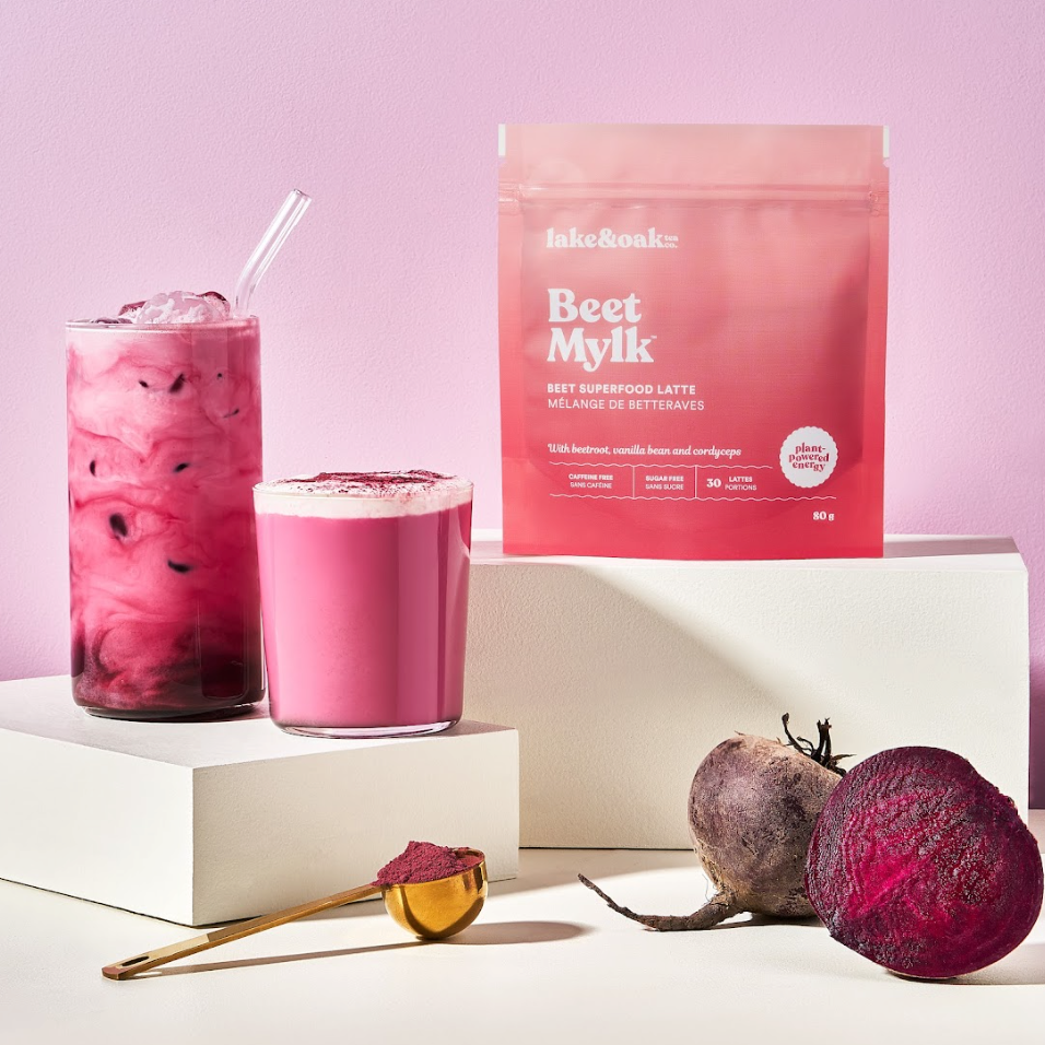 Pink beet milk with a package labeled &