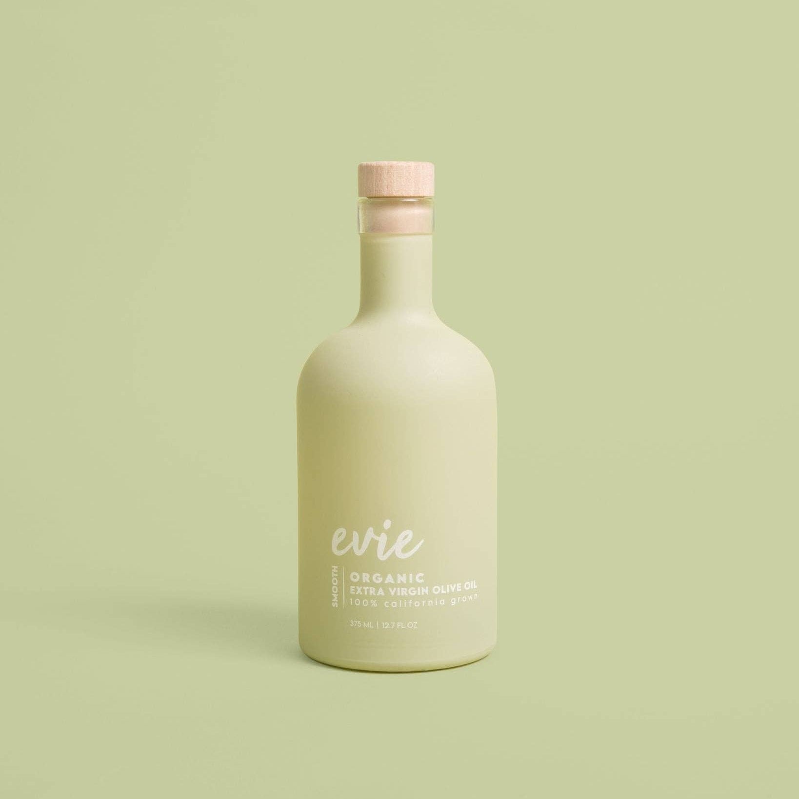 Beige bottle with &