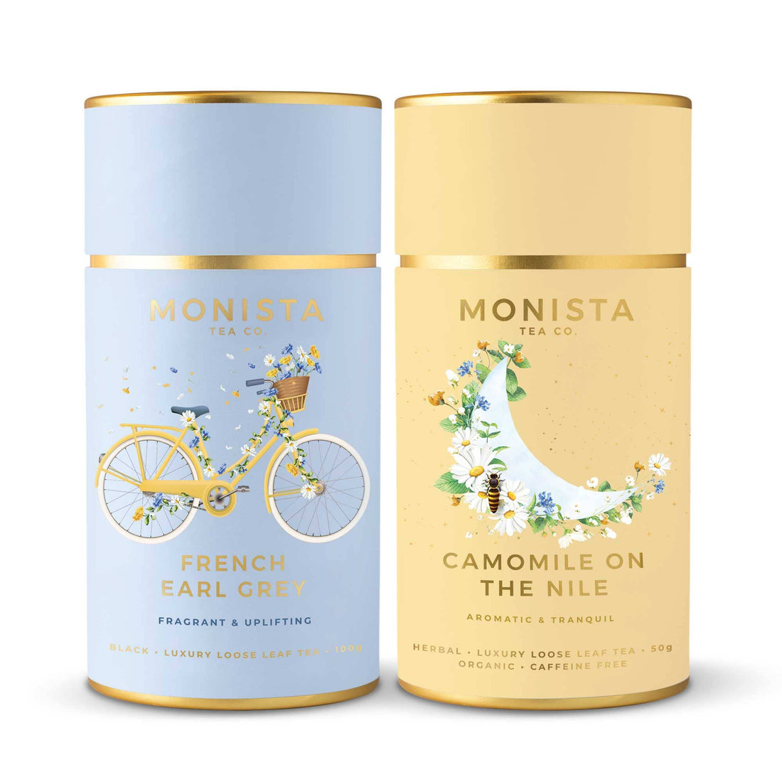 Two Monista Tea Co. tea canisters, one blue with a bicycle illustration and one beige with a sailboat illustration, on a white background.