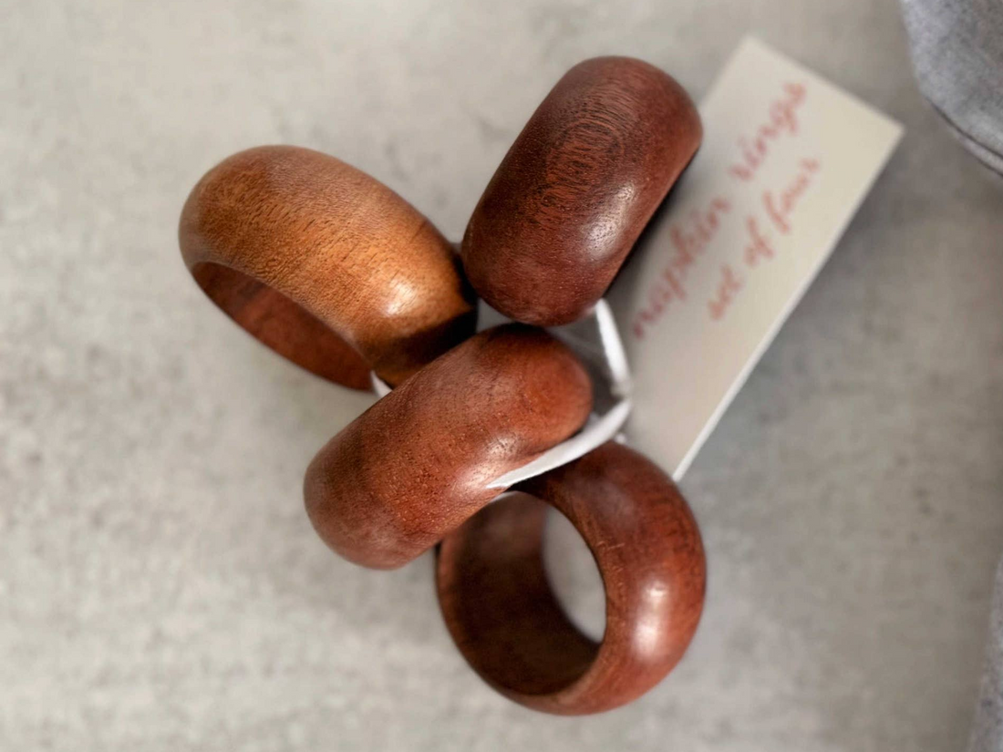 Set of 4 wood round napkin rings with a tag