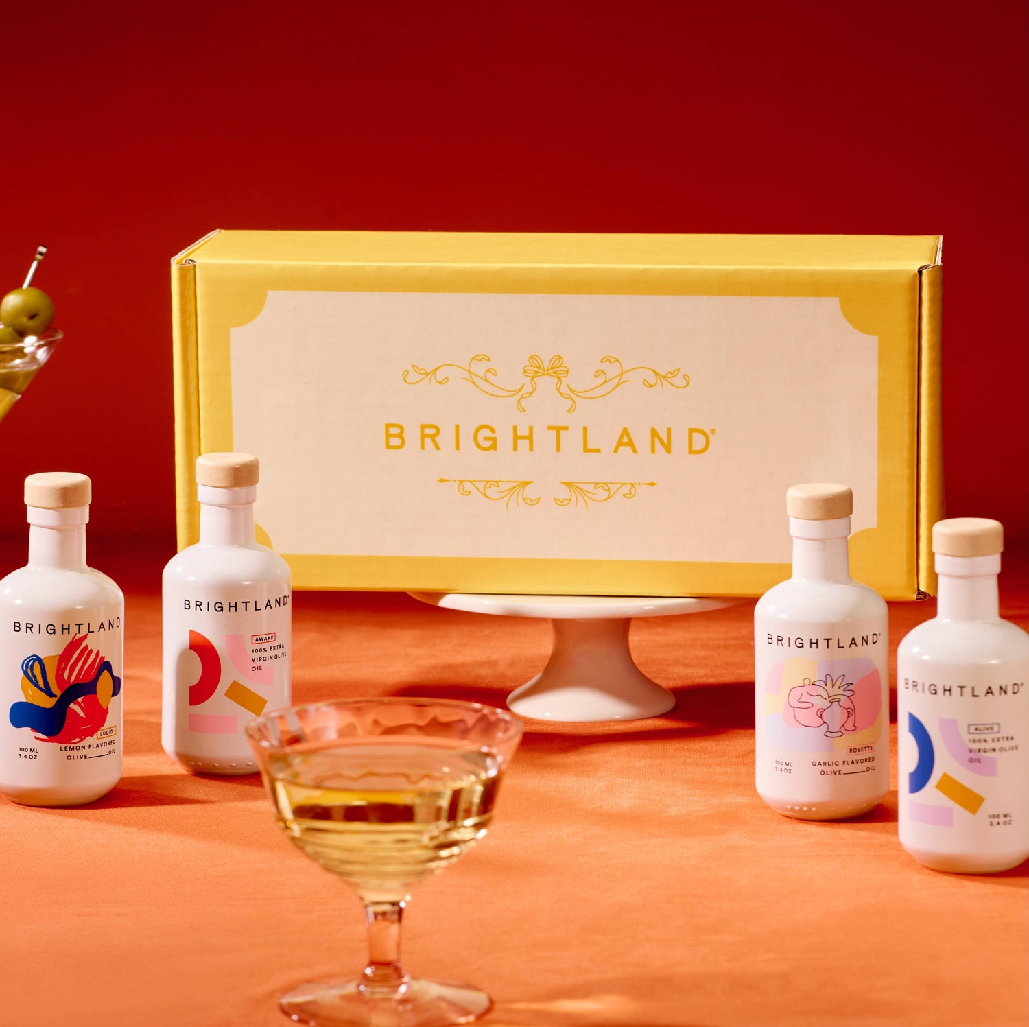 Brightland products with a yellow box on an orange background