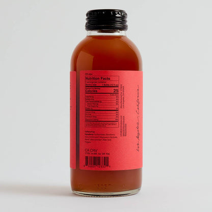 Bottle with a red label on a white background