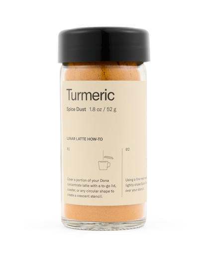 Jar of turmeric spice dust with a black lid on a white background