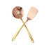 Hand hammered copper skimmer and spatula on a white background