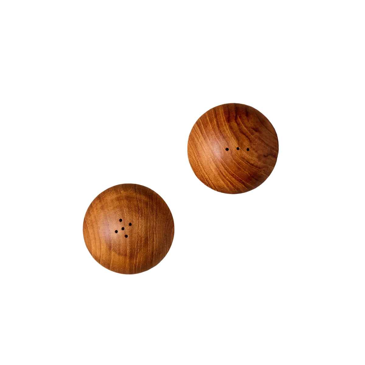Top view of two teak wood salt and pepper shakers on a white background
